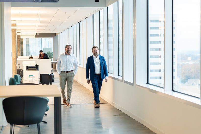 Newcomb & Boyd advisors in the office